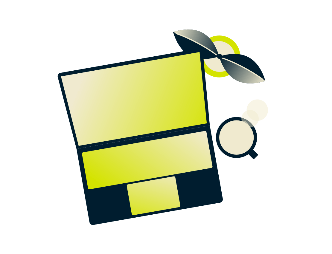 Ordinateur portable avec une plante et une boisson.